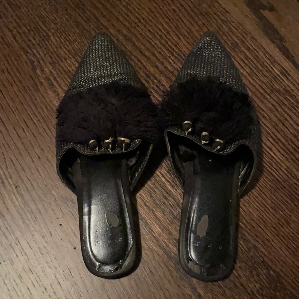 Black rattan flats with tassels